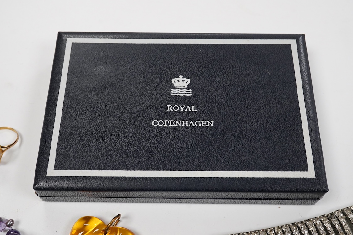 A 9ct and cabochon black onyx set pendant, on a 9ct chain, a 9ct and gem set ring and pair of 9ct and cultured pearl set ear clips, together with other items including costume jewellery, a silver bangle and a silver book